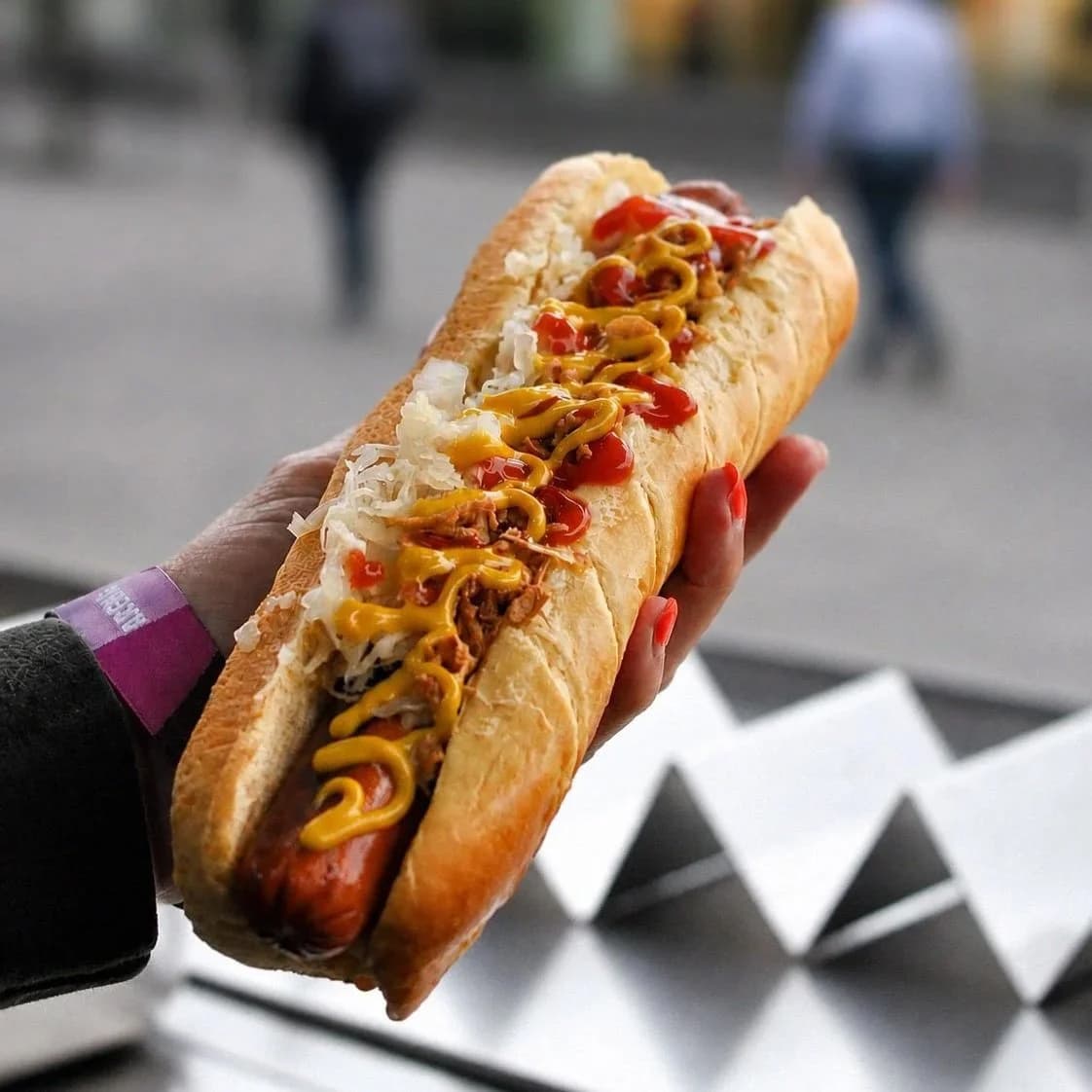 Hot dogs being prepared for a corporate event